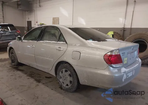 2006 Toyota Camry Le z USA, uszkodzony, nr VIN 4T1BE32K76U671253